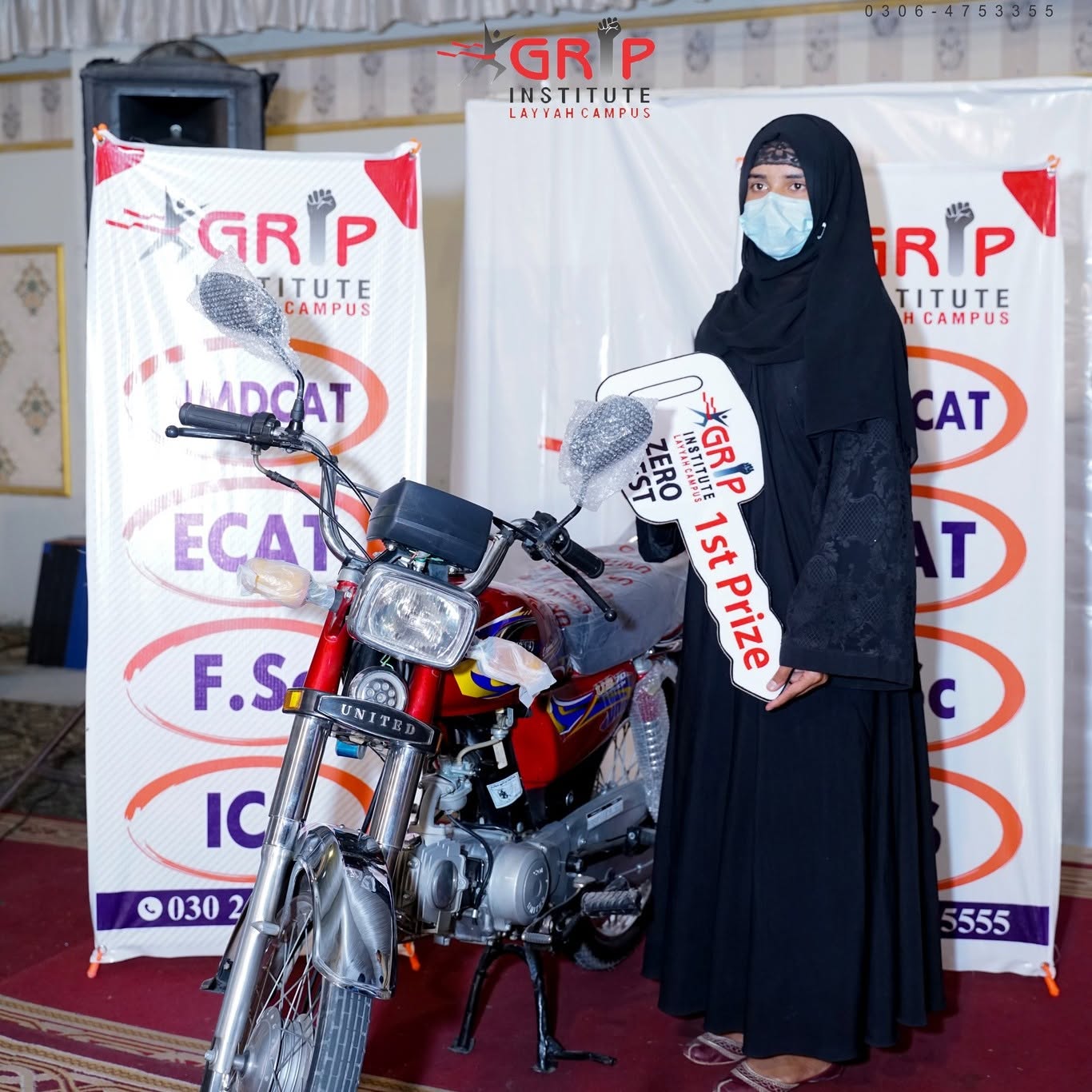 A GRIP Institute student receiving a 1st prize award for the Zero Test program