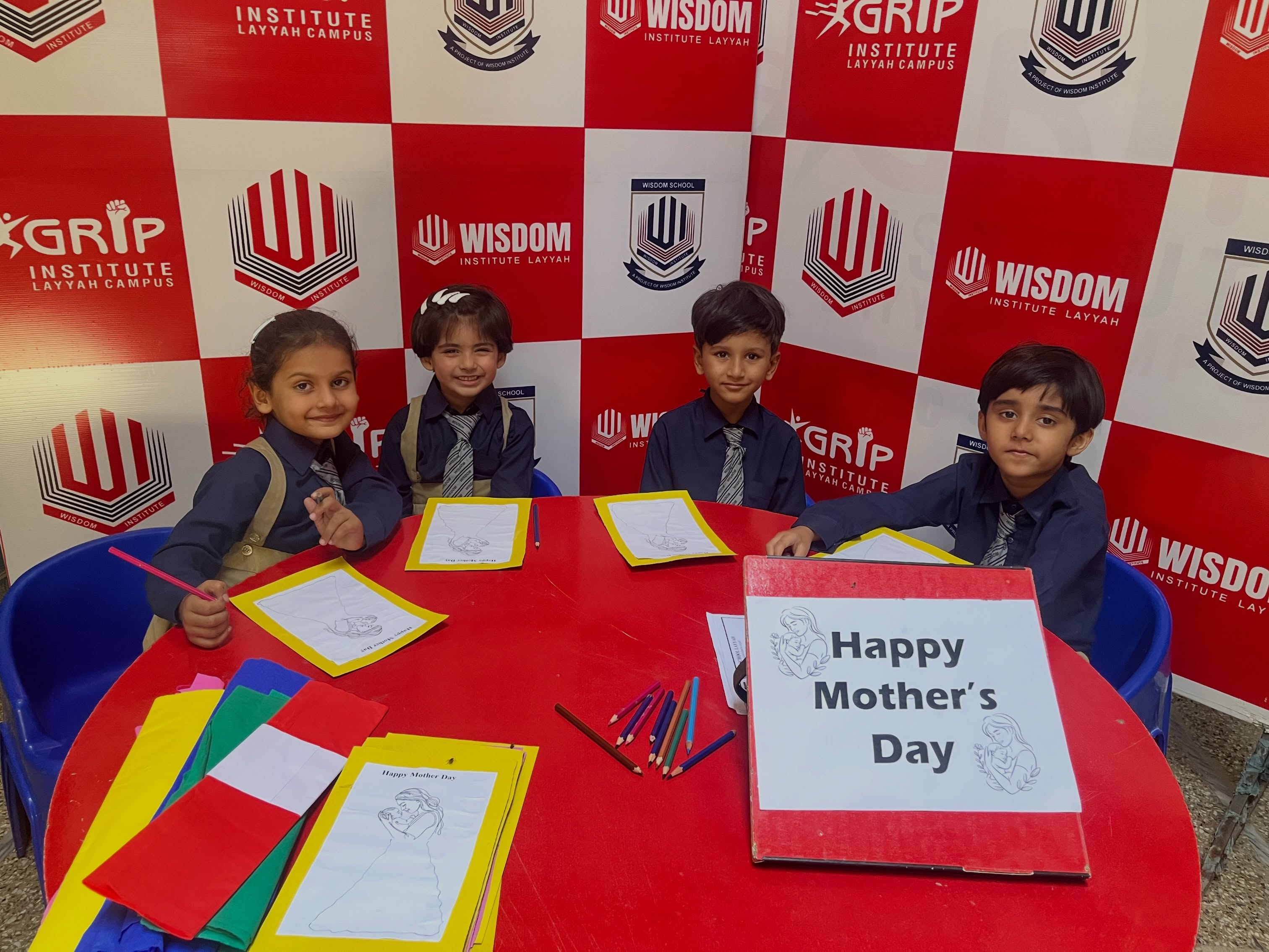 Wisdom School students working on a Mother's Day craft activity